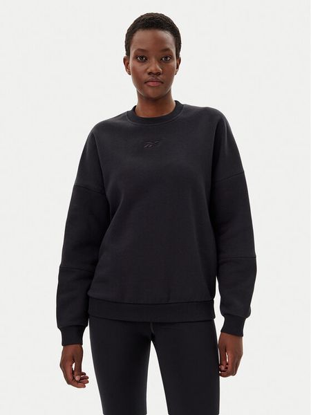 Reebok Bluza 100075359 139-18-00 Czarny Oversize. Czarne bluzy damskie Reebok, m, bez wzorów, z bawełny, bez ramiączek, bez kaptura. Za 106.99 zł.