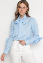 Niebieska Koszula z Ozdobnym Wiązaniem i Falbankami Zalimira. Niebieskie koszule damskie Born2be, bez wzorów, z jeansu, eleganckie, bez kołnierzyka, bez ramiączek. Za 119.99 zł.