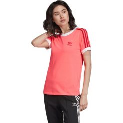 Adidas Originals Koszulka Czerwony. Czerwone bluzki damskie adidas Originals, bez wzorów, z materiału, bez kołnierzyka, bez ramiączek. Za 128.95 zł.