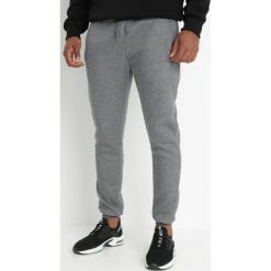 Ciemnoszare Spodnie Argothoe. Szare spodnie sportowe męskie Born2be, m, bez wzorów, z dresówki. Za 39.99 zł.