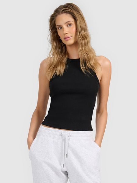 4F Top slim z prążkowanej dzianiny damski - czarny S. Czarne topy damskie 4F, l, bez wzorów, z dzianiny, bez kołnierzyka, bez ramiączek. Za 49.99 zł.