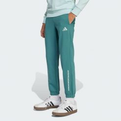 Spodnie adidas Slogan Fleece Pants. Niebieskie spodnie dresowe damskie Adidas, bez wzorów, z dresówki, sportowe. W wyprzedaży za 96.85 zł.