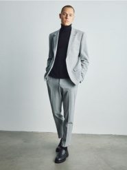 Spodnie garniturowe slim fit - jasnoszary. Szare garnitury męskie Reserved, l, bez wzorów, z tkaniny. Za 169.99 zł.