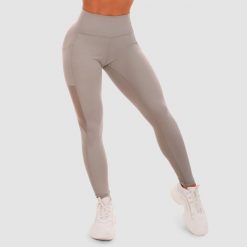 Legginsy damskie fitness z panelami szare Mesh Panel. Szare legginsy damskie GYMBEAM, bez wzorów, z elastanu. Za 115.90 zł.