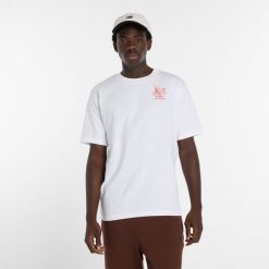 Koszulka męska New Balance MT61H51DWT – biała. Białe koszulki sportowe męskie New Balance, l, bez wzorów, z dresówki, bez ramiączek. Za 169.99 zł.