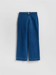 Jeansy z szeroką nogawką - niebieski. Niebieskie jeansy damskie Reserved, bez wzorów, z bawełny. Za 129.99 zł.