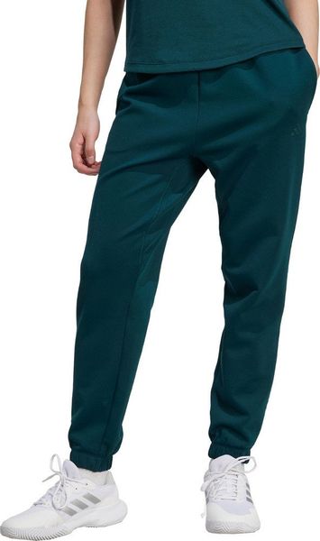 Spodnie damskie adidas Yoga Essentials zielone JY2812 M. Zielone spodnie dresowe damskie Adidas, bez wzorów, sportowe. Za 391.83 zł.