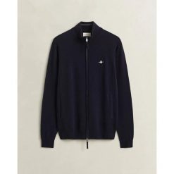 Kardigan zapinany na zamek Gant Superfine. Niebieskie swetry męskie GANT, s, bez wzorów, z materiału, eleganckie, bez kołnierzyka, bez ramiączek. Za 492.50 zł.