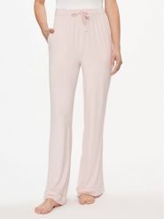 Tommy Hilfiger Spodnie dresowe UW0UW05195 Różowy Relaxed Fit. Czerwone spodnie dresowe damskie Tommy Hilfiger, bez wzorów, z dresówki. Za 229.99 zł.