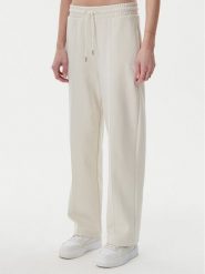 Puma Spodnie dresowe Ess 629774 Beżowy Straight Fit. Brązowe spodnie dresowe damskie Puma, bez wzorów, z bawełny. Za 199.99 zł.