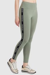 GUESS Zielone legginsy damskie z lampasami. Zielone legginsy damskie Guess, z aplikacjami, z bawełny. W wyprzedaży za 149.99 zł.