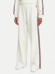 Tommy Hilfiger Spodnie dresowe UW0UW06628 Kremowy Wide Leg. Białe spodnie dresowe damskie Tommy Hilfiger, bez wzorów, z bawełny. Za 329.99 zł.