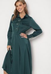 Zielona Rozkloszowana Sukienka o Koszulowym Kroju z Imitacją Kieszeni i Gumką w Talii Rizza. Zielone sukienki damskie Born2be, na co dzień, l, bez wzorów, eleganckie, bez kołnierzyka, bez ramiączek, midi, koszulowe. Za 169.99 zł.