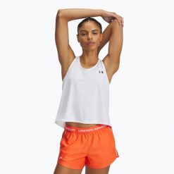 Top treningowy damski Under Armour Tech Swing Tank. Białe topy damskie Under Armour, m, bez wzorów, sportowe, bez kołnierzyka, bez ramiączek. Za 79.99 zł.