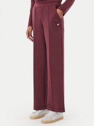 Guess Spodnie dresowe V6YB18 K4315 Bordowy Regular Fit. Czerwone spodnie dresowe damskie Guess, z aplikacjami, z dresówki. Za 394.99 zł.