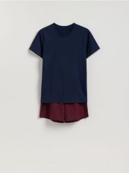 Dwuczęściowa piżama z bawełny - granatowy. Niebieskie piżamy męskie Reserved, l, bez wzorów, z bawełny, bez kołnierzyka, bez ramiączek. Za 99.99 zł.