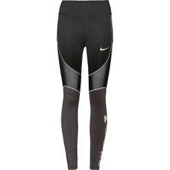 Legginsy sportowe w kolorze czarnym. Czarne legginsy damskie Nike Women, xl, bez wzorów, z materiału, dri-fit (nike). W wyprzedaży za 169.95 zł.
