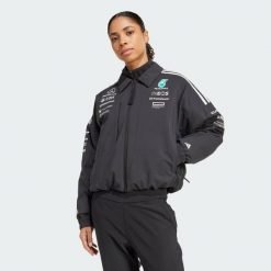 Bluza Mercedes - AMG Petronas Formula One Team. Białe bluzy damskie Adidas, l, bez wzorów, z materiału, bez ramiączek, bez kaptura. Za 899.00 zł.