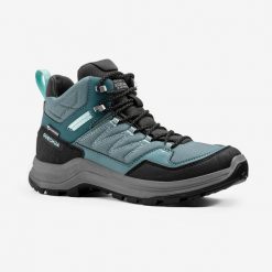 Buty turystyczne damskie Quechua MH100 Mid wodoodporne. Obuwie trekkingowe damskie QUECHUA, z kauczuku, przed kolano, bez zapięcia. Za 269.99 zł.