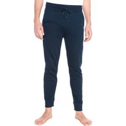 Tommy Hilfiger Spodnie do spania Niebieski. Niebieskie piżamy męskie Tommy Hilfiger, s, bez wzorów, z bawełny, bez kołnierzyka, bez ramiączek. Za 352.95 zł.