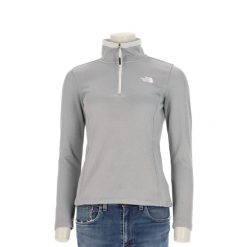 Second life - Bluza polarowa damska The North Face szara - Stan bardzo dobry. Szare bluzy damskie The North Face, l, bez wzorów, z materiału, eleganckie, bez ramiączek, bez kaptura. Za 127.76 zł.