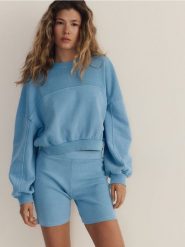 Góra od piżamy - jasnoniebieski. Niebieskie piżamy damskie Reserved, bez wzorów, z bawełny, bez ramiączek. W wyprzedaży za 49.99 zł.