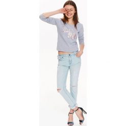 BLUZA DAMSKA NIEROZPINANA Z NADRUKIEM. Szare bluzy damskie TROLL, na lato, xl, bez wzorów, z dresówki, bez ramiączek, bez kaptura. W wyprzedaży za 29.99 zł.