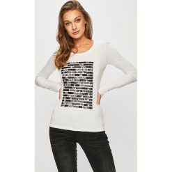 Guess Jeans - Bluzka. Białe bluzki damskie Guess Jeans, s, z aplikacjami, z bawełny, bez kołnierzyka, bez ramiączek. W wyprzedaży za 129.90 zł.