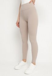 Beżowe Prążkowane Legginsy z Szeroką Gumką w Talii Lanessiel. Brązowe legginsy damskie Born2be, bez wzorów, z jeansu. Za 39.99 zł.