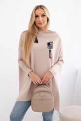 Bluza oversize z asymetrycznymi bokami beżowa. Brązowe bluzy damskie KESI, l, bez wzorów, z bawełny, bez ramiączek, bez kaptura. Za 209.11 zł.