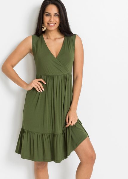 Sukienka z dżerseju z mieszanki wiskozy. Zielone sukienki damskie bonprix, na lato, bez wzorów, z dżerseju, bez kołnierzyka, bez ramiączek, kopertowe. Za 119.99 zł.