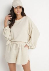 Beżowy Dzianinowy Komplet Bluza i Szorty Novanisa. Brązowe bluzy damskie Born2be, na lato, bez wzorów, z dzianiny, klasyczne, bez ramiączek, bez kaptura. Za 129.99 zł.
