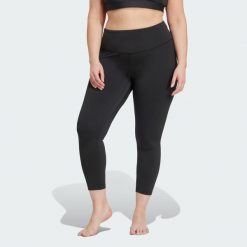Legginsy All Me 7/8 (Plus Size). Czarne legginsy damskie Adidas, bez wzorów, z materiału. Za 279.00 zł.