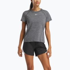Koszulka Reebok Id Train Tee. Czarne bluzki damskie REEBOK FITNESS, bez wzorów, sportowe, bez kołnierzyka, bez ramiączek. Za 79.99 zł.