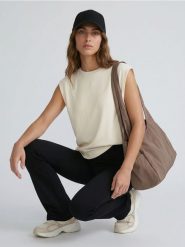 Legginsy flare z dzianiny technicznej - czarny. Czarne legginsy damskie Sinsay, bez wzorów, z dzianiny. Za 39.99 zł.
