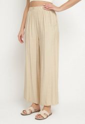 Beżowe Szerokie Spodnie Typu Palazzo z Wysokim Stanem Varlevi. Brązowe spodnie materiałowe damskie Born2be, bez wzorów, z jeansu, eleganckie, z podwyższonym stanem. Za 39.99 zł.