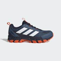 Buty trekkingowe Terrex Rockadia. Białe trekkingi męskie Adidas, z materiału, bez zapięcia. Za 259.00 zł.