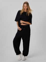 4F Regular Size: Spodnie dresowe joggery 4F | Tomasz Fornal - czarne M. Czarne spodnie sportowe męskie 4F, m, bez wzorów, z dresówki, na fitness i siłownię. Za 199.99 zł.