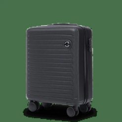 Walizka KABINOWA Wings ABS+ COOT 20" Black. Czarne walizki damskie Wings, bez wzorów, z materiału. Za 219.00 zł.