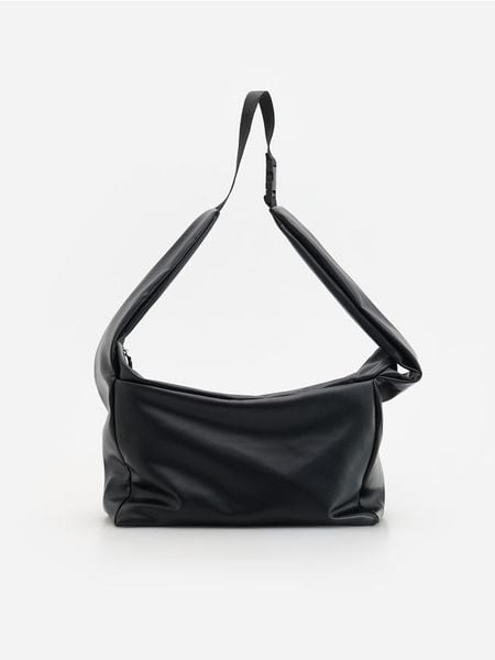 Torba na ramię - czarny. Czarne torby na ramię męskie Reserved, ze skóry, na ramię, małe. Za 179.99 zł.