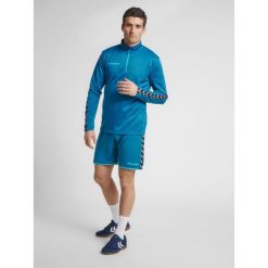 Bluza Hummel demi-zip hmlAUTHENTIC. Białe bluzy męskie Hummel, m, bez wzorów, z materiału, sportowe, bez ramiączek, bez kaptura. Za 204.20 zł.