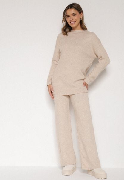 Beżowy Dzianinowy Komplet z Bawełną i Wełną Długi Sweter i Szerokie Spodnie Reinesa. Brązowe swetry nierozpinane damskie Born2be, l, bez wzorów, z bawełny, bez kołnierzyka, bez ramiączek. Za 139.99 zł.