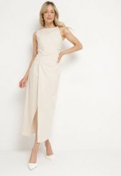 Jasnobeżowa Sukienka Dopasowana z Bawełną i Wiskozą z Rozcięciem Turilia. Brązowe sukienki damskie Born2be, na co dzień, m, bez wzorów, z bawełny, eleganckie, bez kołnierzyka, bez ramiączek, maxi, dopasowane. Za 99.99 zł.