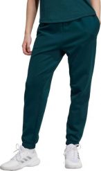 Adidas Spodnie damskie adidas Yoga Essentials zielone JY2812 L. Zielone spodnie dresowe damskie Adidas, bez wzorów, sportowe. Za 279.27 zł.