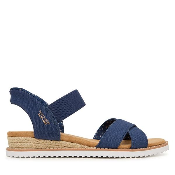 Sandały Skechers. Niebieskie sandały damskie Skechers, bez wzorów, bez obcasa, na płaskiej podeszwie, bez zapięcia. Za 200.99 zł.
