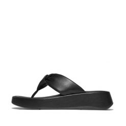 Sandały damskie FitFlop F-Mode Knot Soft-Leather Flatform Toe-Post. Czarne sandały damskie FIT FLOP, bez wzorów, z materiału, bez obcasa, bez zapięcia. Za 647.50 zł.