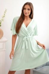 Sukienka z przekładanym dekoltem ciemno miętowa. Zielone sukienki damskie Kesi Włoski, na lato, l, bez wzorów, z bawełny, eleganckie, bez kołnierzyka, bez ramiączek. Za 142.18 zł.