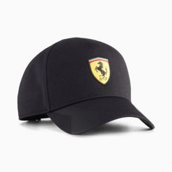 Czapka z daszkiem unisex Puma FERRARI czarna 02689102. Czarne czapki damskie Puma, bez wzorów, z materiału, sportowe. Za 141.33 zł.