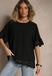 Czarna Bluzka Ozdobiona Ażurowymi Rękawami Vorana. Czarne bluzki damskie Renee, xl, w ażurowe wzory, z jeansu, eleganckie, bez kołnierzyka, bez ramiączek. Za 54.99 zł.