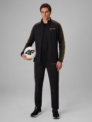 4F Spodnie treningowe szybkoschnące męskie 4F x Robert Lewandowski - czarne M. Czarne spodnie materiałowe męskie 4F, m, bez wzorów, z dresówki, na fitness i siłownię. Za 229.99 zł.